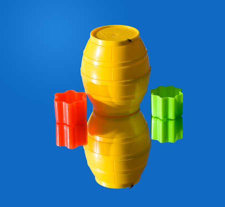 Three objects on a mirror. Under the blue skyの写真素材