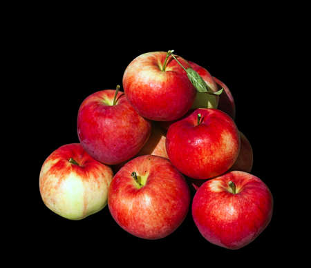 Pyramid of ripe apples on blackの写真素材