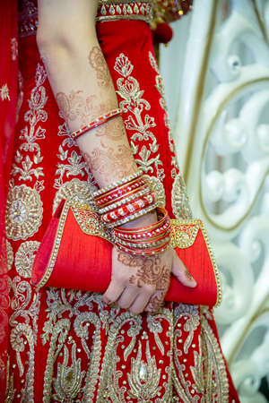 bride holding her clutch bag