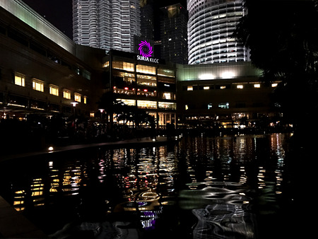 Kuala Lumpur, Malaysia - October 10, 2016: Night scene of Petronas Twin towers and Suria KLCC.のeditorial素材