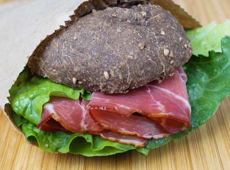 Ham and cheese sandwich on a rye breadの写真素材