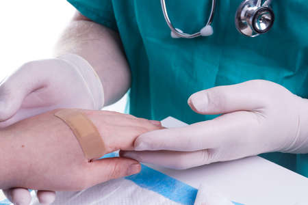 Adhesive Bandage. Bandaging at Wound by the Doctorの写真素材