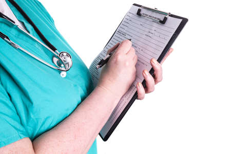 Female doctor fills patient registration