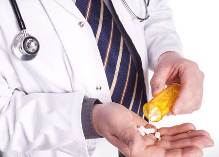 Doctor with Medicin in Hand, Isolated on Whiteの写真素材