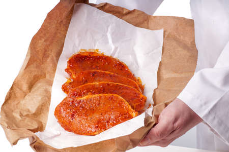 Raw marinated meat for bbq, pork chopの写真素材