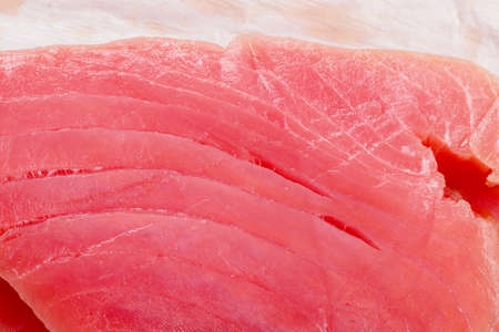 Tuna fish, fresh steaks ready for cooking an mealの写真素材