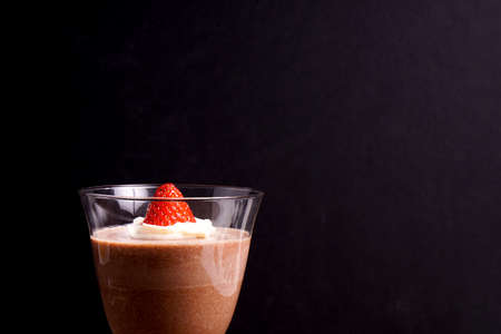 Chocolate mousse pudding served in a glassの写真素材