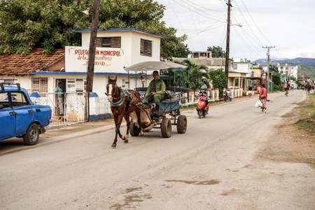Trinidad, Cuba - January 14, 2016: Trinidad's residents still use horse-drawn carriages as the preferred vehicle. Cuba has one of lowest vehicle per capita rates in the worldのeditorial素材