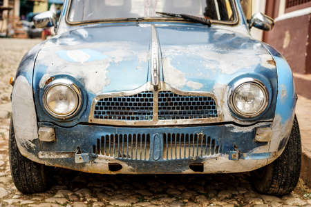 One Old blue scramble rusty vintage car