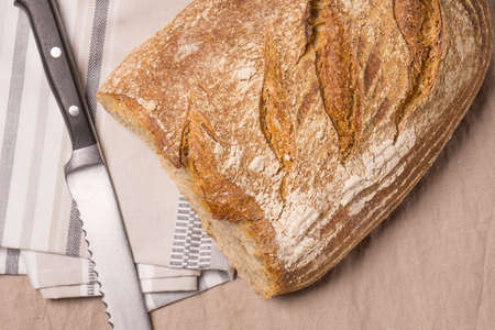 Loaf of fresh baked Organic whole wheat breadの写真素材