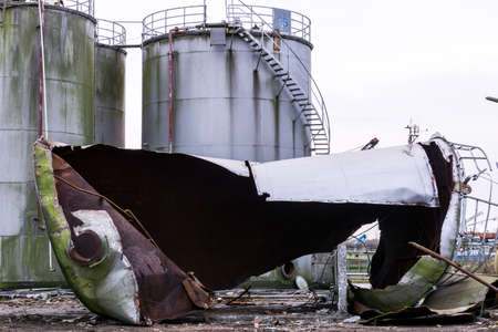 degradation of industrial materials, destroyed silos, twisted metal, decompositionの写真素材