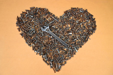 Love Heart Wrench Tool Mechanical Steel Hex Nut Rusty Ocherの写真素材