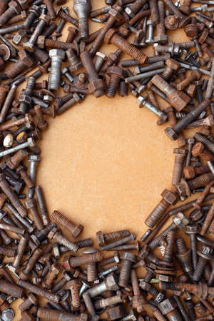 Bolt Plain Stainless Threaded Rod Tool Mechanical Steel Hex Nut Rusty Ocher Background Texture Circle Writing Zone Posterの写真素材