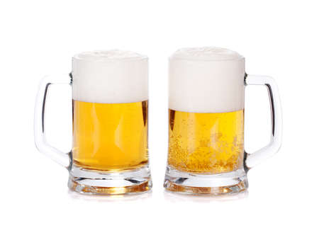 Two beer mugs isolated on a white backgroundの写真素材