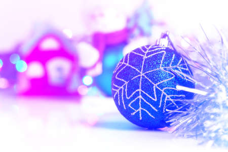 Blue Christmass ball with blury festive glitter lights backgroundの写真素材