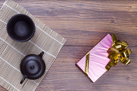 Valentine gift pack with set of tea on wooden background