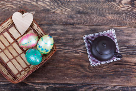 Easter festive decorations for meal on wooden backgroundの写真素材