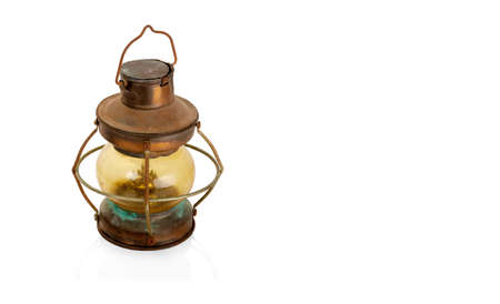 Retro copper kerosene lantern closeup isolated on white