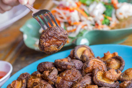 fried shiitake mushrooms with saltの写真素材