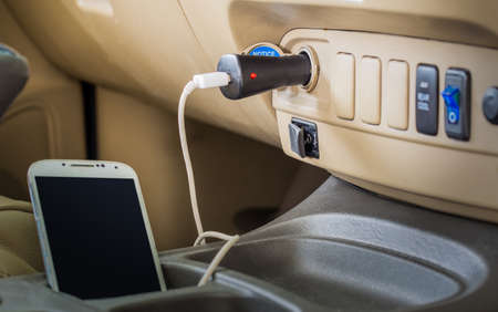 Charger plug phone on carの写真素材