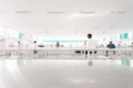 blur image of people sit in The interior of the factory canteenの写真素材