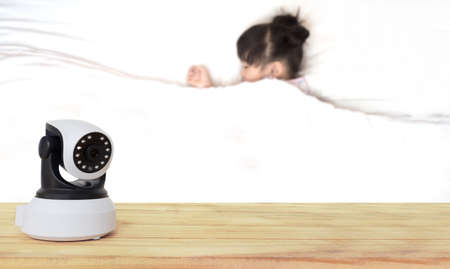 Security camera on Wood table. IP Camera.の写真素材