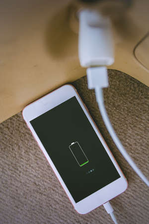 Charger plug phone on carの写真素材