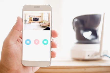 Security camera on Wood table. IP Camera.