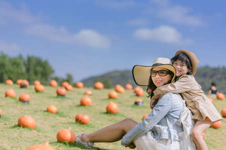 concept of family. mother and child daughter outdoors in summerの写真素材