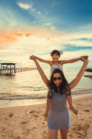 concept of family. mother and child daughter outdoors in summerの写真素材