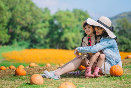 concept of family. mother and child daughter outdoors in summerの写真素材