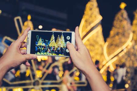 Smartphone take shot food photo, Light decorate on Christmas Tree Celebration 2017 at Department store for Christmas day and Happy New Year eventの写真素材