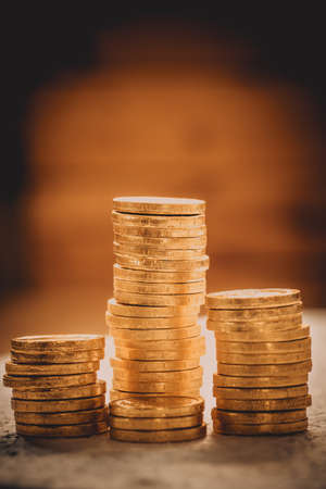 golden coins concept on a wood table. Taxpayer business conceptの写真素材