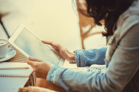 Happy business woman using a tablet computerの写真素材