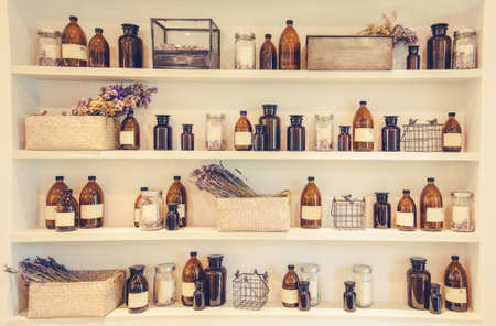 blurred  Image Spa collage series ,shelf Bottle of massage oil in sPaの写真素材