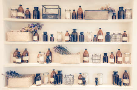 blurred  Image Spa collage series ,shelf Bottle of massage oil in sPaの写真素材