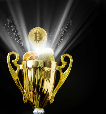 Bitcoin BTC coins on trophyの写真素材