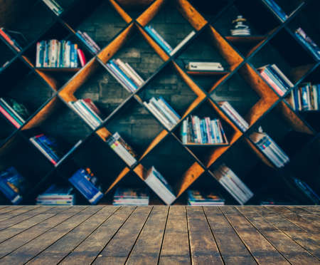 blurred Image many old books on bookshelf in libraryの写真素材