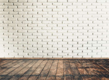 vintage room with brick wall and wooden floor backgroundの写真素材