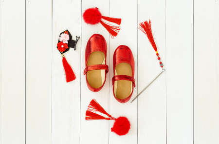 accessories for Chinese New Year on wood tabelの写真素材