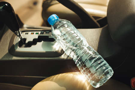 Warning Leaving bottled water in your car could start a fireの写真素材