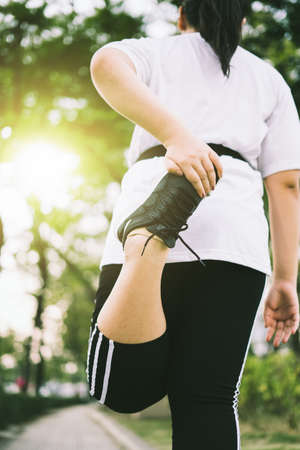 women Exercising In Parkの写真素材
