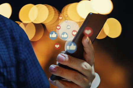 Hand using smart phone with Social media concept.の写真素材
