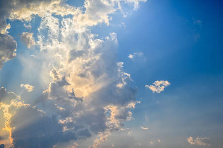 Sunset / sunrise with clouds, light raysの写真素材