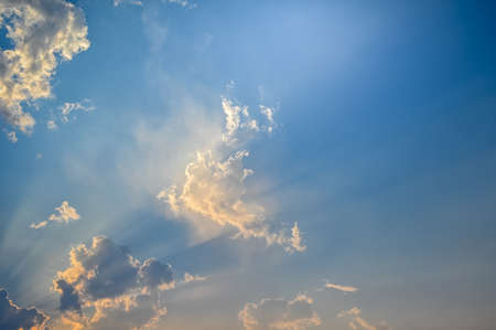 Sunset / sunrise with clouds, light raysの写真素材