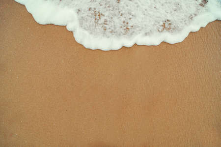 beautiful sandy beach and soft blue ocean wave