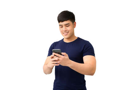 Happy male using smartphone isolated on white backgroundの写真素材