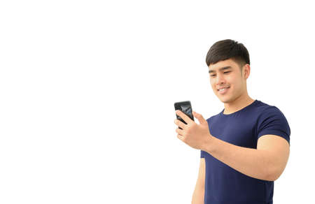 Happy male using smartphone isolated on white backgroundの写真素材