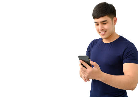 Happy male using smartphone isolated on white backgroundの写真素材