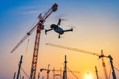 Drone over construction site. video surveillance or industrial inspectionの写真素材